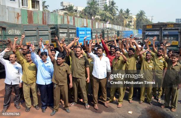 Garbage van workers protest against contractor for low quality uniforms and payments at Ghantagadi Workshop Majiwada, on February 22, 2018 in Mumbai,...