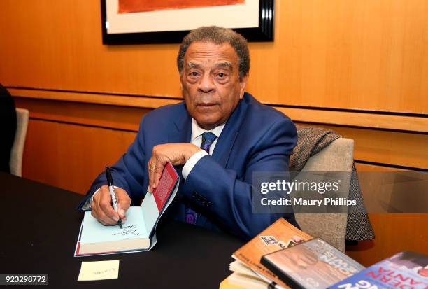 Ambassador Andrew Young sign copies of his book during "Passing The Torch From Selma To Today" documentary screening at Skirball Cultural Center on...