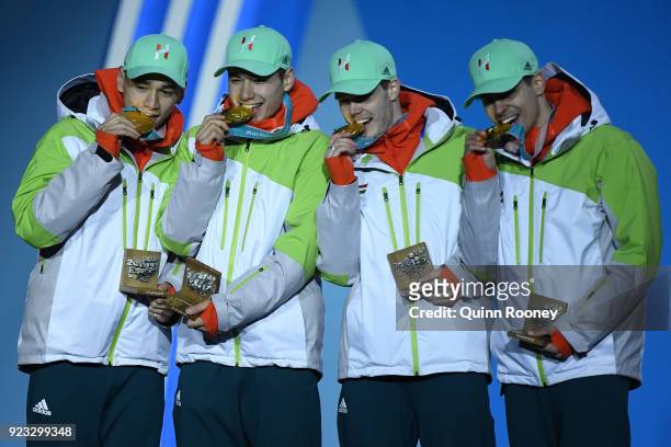 Gold medalists Shaoang Liu, Shaolin Sandor Liu, Viktor Knoch and Csaba Burjan of Hungary celebrate during the medal ceremony for Short Track Speed...