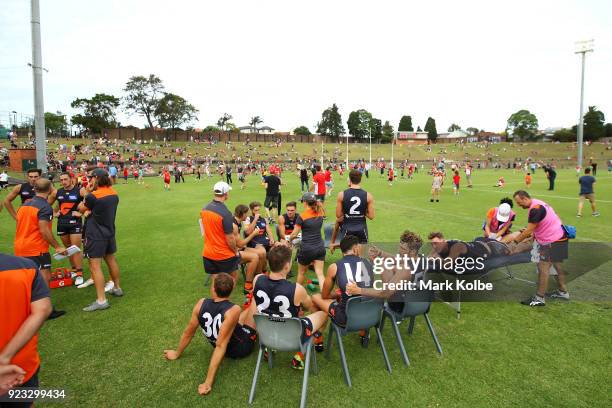 The Giants sit on the field during the halftime break of the AFL Inter Club match between the Sydney Swans and the Greater Western Sydney Giants at...