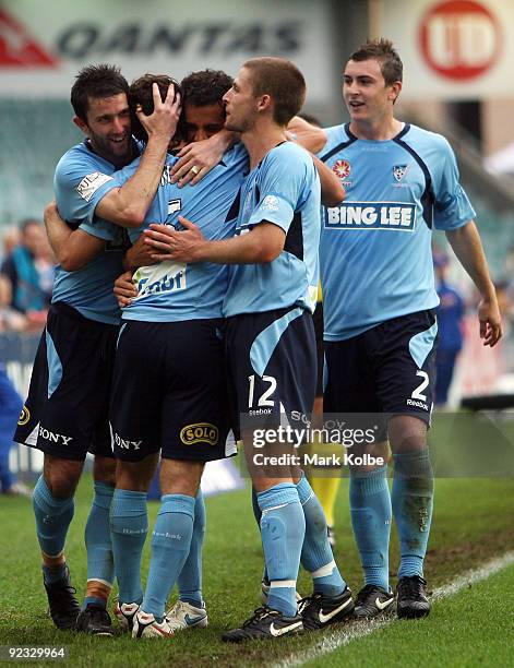 Karol Kisel of Sydney FC celebrates with his team-mates after scoring a goal during the round 12 A-League match between Sydney FC and the Brisbane...