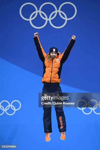 Gold medalist Suzanne Schulting of the Netherlands celebrates during the medal ceremony for Short Track Speed Skating - Ladies' 1,000m on day 14 of...