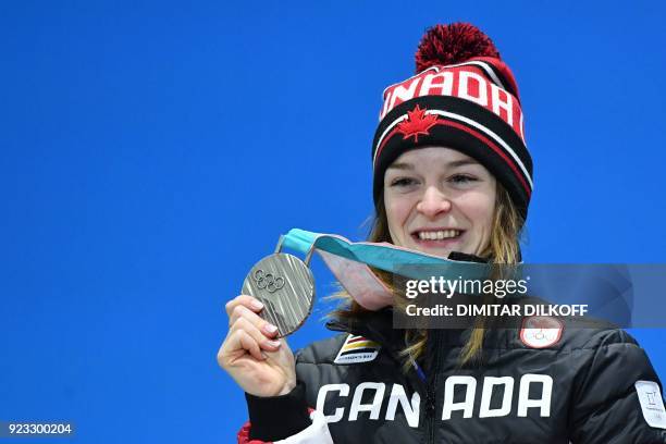 Canada's silver medallist Kim Boutin poses on the podium during the medal ceremony for the short track Women's 1000m at the Pyeongchang Medals Plaza...