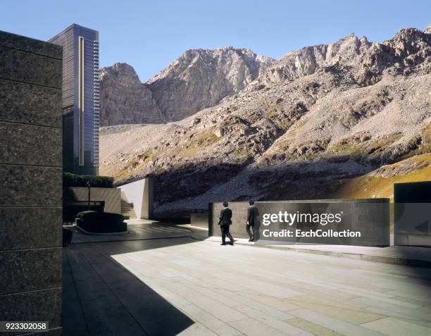 businessmen at zen-like office park at foot of mountain range - switzerland business stock pictures, royalty-free photos & images