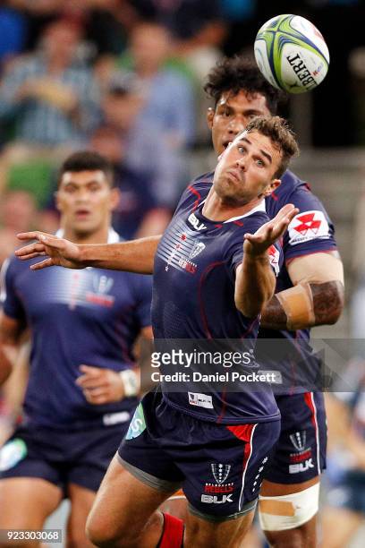 Tom English of the Rebels catches a stray pass during the round two Super Rugby match between the Melbourne Rebels and the Queensland Reds at AAMI...