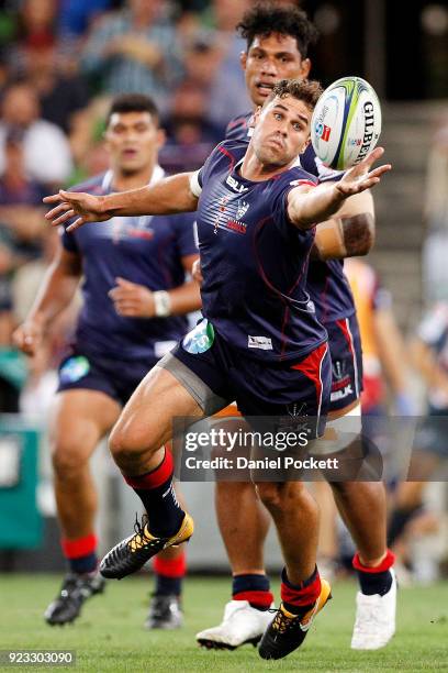 Tom English of the Rebels catches a stray pass during the round two Super Rugby match between the Melbourne Rebels and the Queensland Reds at AAMI...