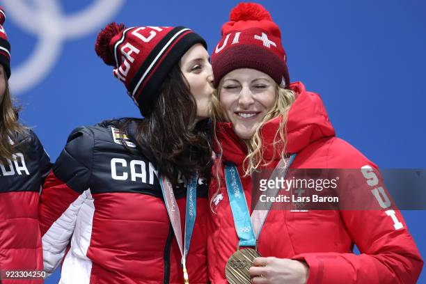 Gold medalist Kelsey Serwa of Canada and bronze medalist Fanny Smith of Switzerland celebrate during the medal ceremony for Freestyle Skiing -...