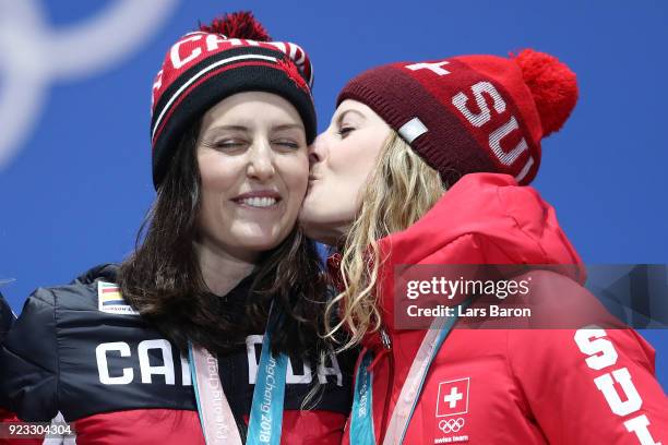 Gold medalist Kelsey Serwa of Canada and bronze medalist Fanny Smith of Switzerland celebrate during the medal ceremony for Freestyle Skiing -...
