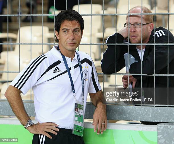 Head coach Marco Pezzaiuoli of Germany and Matthias Sammer,sporting director of the German Football Association DFB are seen prior to the FIFA U17...
