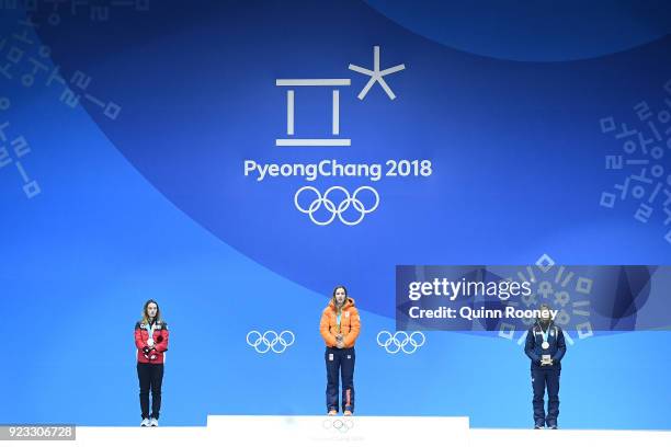 Silver medalist Kim Boutin of Canada, gold medalist Suzanne Schulting of the Netherlands and bronze medalist Arianna Fontana of Italy stand on the...