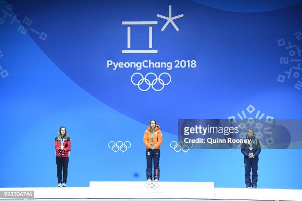 Silver medalist Kim Boutin of Canada, gold medalist Suzanne Schulting of the Netherlands and bronze medalist Arianna Fontana of Italy stand on the...