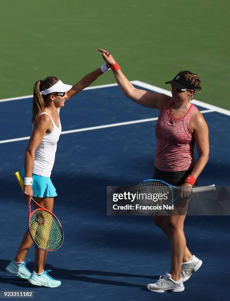 Alicja Rosolska of Poland and Abigail Spears of USA celebrates a point against Hao-Ching Chan of Taiwan and Zhaoxuan Yang of China during the women's...