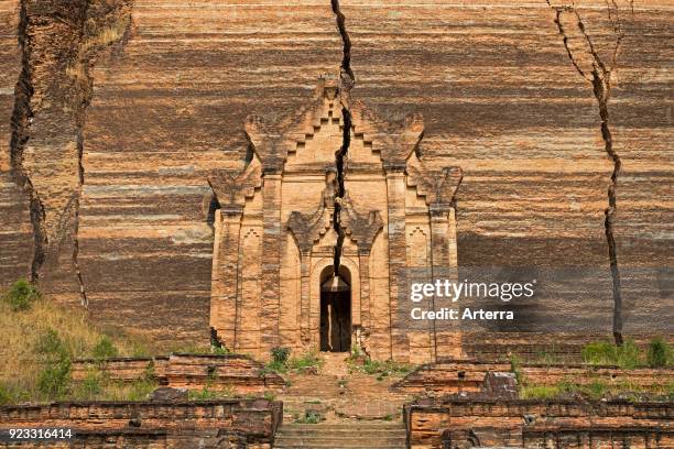 Mingun pagoda - Mingun Pahtodawgy - cracked temple, incomplete monument stupa in Mingun near Mandalay in Sagaing Region in central Myanmar - Burma.