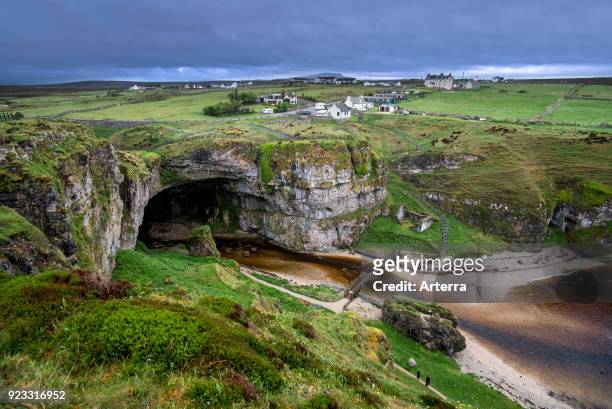Smoo Cave, large combined sea cave and freshwater cave near Durness, Sutherland, Highland, Scotland, UK.
