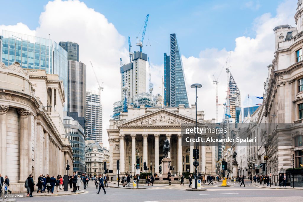 Street in City of London with Royal Exchange, Bank of England and new modern skyscrapers, England, UK