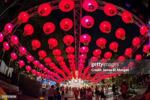 Hundreds of visitors enjoy the night during the opening of the Chinese New Year Lantern Festival at Tumbalong Park on February 23, 2018 in Sydney,...