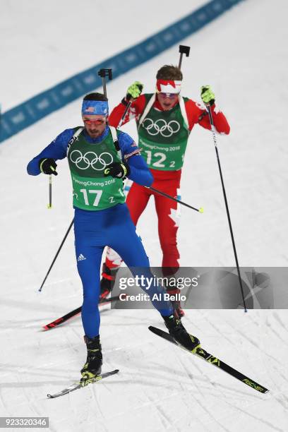 Sean Doherty of the United States competes with Scott Gow of Canada during the Men's 4x7.5km Biathlon Relay on day 14 of the PyeongChang 2018 Winter...