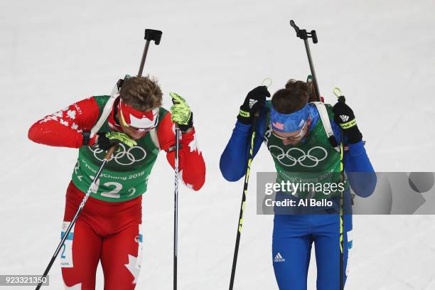 Scott Gow of Canada and Sean Doherty of the United States compete during the Men's 4x7.5km Biathlon Relay on day 14 of the PyeongChang 2018 Winter...