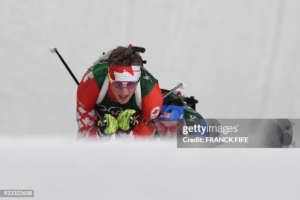 Canada's Scott Gow and US Sean Doherty compete in the men's 4x7,5km biathlon relay event during the Pyeongchang 2018 Winter Olympic Games on February...