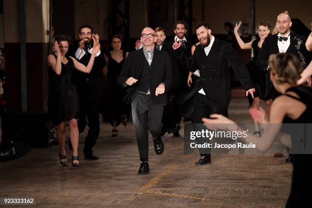 Designer Antonio Marras acknowledges the applause of the public after the Antonio Marras show during Milan Fashion Week Fall/Winter 2018/19 on...