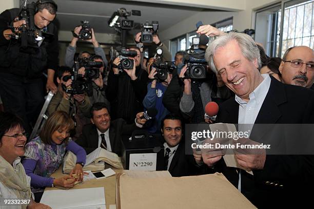 Uruguay's current President Tabare Vazquez casts his vote during a Presidential general elections on October 25, 2009 in Montevideo, Uruguay.