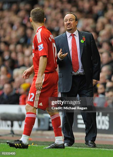 Liverpool Manager Rafael Benitez issues instructions to Fabio Aurelio of Liverpool during the Barclays Premier League match between Liverpool and...