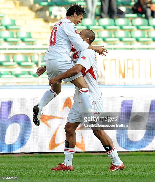 Paulo Barreto and Sergio Almiron of AS Bari celebrate after the first goal during the Serie A match between Bari and Lazio at Stadio San Nicola on...