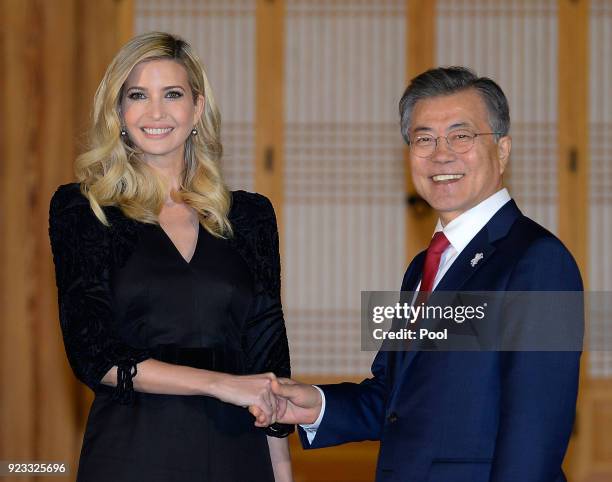 South Korean President Moon Jae-In shakes hands with Ivanka Trump during their dinner at the Presidential Blue House on February 23, 2018 in Seoul,...