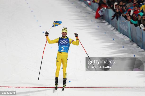 Fredrik Lindstroem of Sweden celebrates winning the gold medal during the Men's 4x7.5km Biathlon Relay on day 14 of the PyeongChang 2018 Winter...