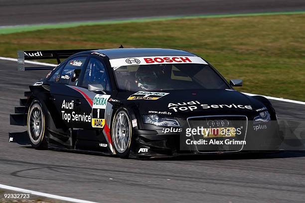 Audi driver Timo Scheider of Germany steers his car during the final run of the DTM 2009 German Touring Car Championship at the Hockenheim race track...
