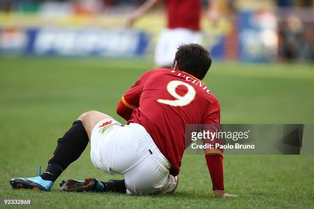 Mirko Vucinic of AS Roma on the ground during the Serie A match between Roma and Livorno Calcio at Stadio Olimpico on October 25, 2009 in Rome, Italy.