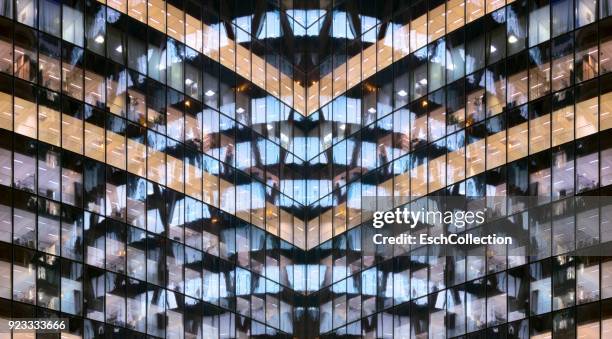 reflections in glass office facade at dusk - investment abstract stock pictures, royalty-free photos & images