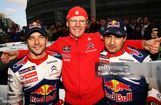 Sebastien Loeb of France and Citroen Total WRT and his co-driver Daniel Elena celebrate after winning the World Championship and the Wales Rally GB...