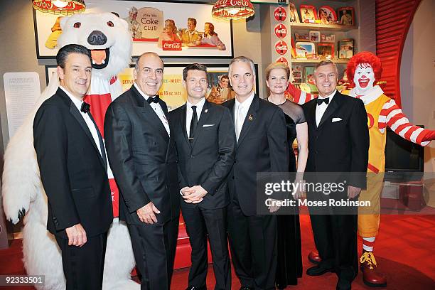 Javier C. Goizueta, the Coca-Cola Polar Bear, Muhtar Kent, Ryan Seacrest Ralph Alvarez, Linda Morris, Bob Morrison and Ronald McDonald. Attend a...