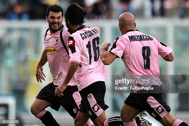 Cesare Bovo celebrates with Mattia Cassani and Giulio Migliaccio of Palermo after scoring the winning goal during the Serie A match between US Citta...