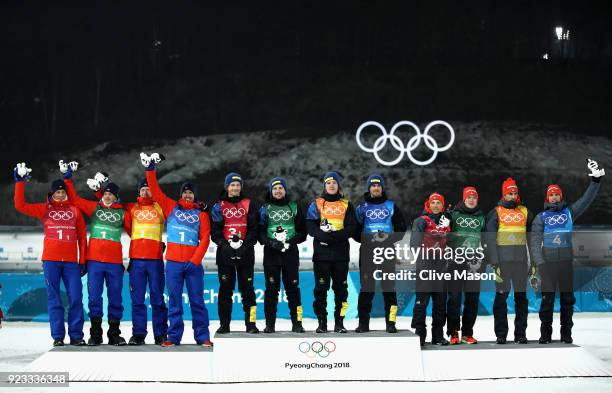 Silver medallists Lars Helge Birkeland, Tarjei Boe, Johannes Thingnes Boe and Emil Hegle Svendsen of Norway pose with gold medallists Peppe Femling,...