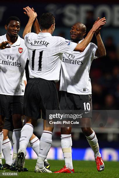 Robin van Persie of Arsenal celebrates with William Gallas of Arsenal after Gallas scored during the Barclays Premier League match between West Ham...