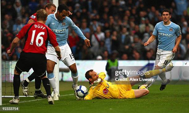 Joleon Lescott of Manchester City scores the opening goal during the Barclays Premier League match between Manchester City and Fulham at the City of...