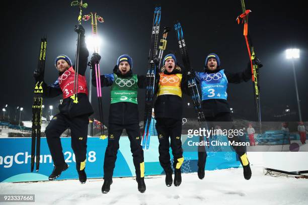 Gold medallists Peppe Femling, Jesper Nelin, Sebastian Samuelsson and Fredrik Lindstroem of Sweden celebrate during the victory ceremony for the...