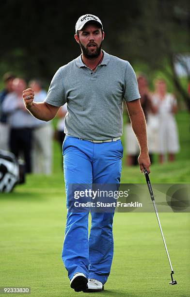 Christian Nilsson of Sweden celebrates his putt on the 17th hole during the final round of the Castello Masters Costa Azahar at the Club de Campo del...