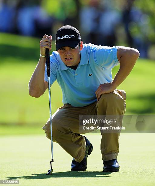 Martin Kaymer of Germany lines up his putt on the third hole during the final round of the Castello Masters Costa Azahar at the Club de Campo del...