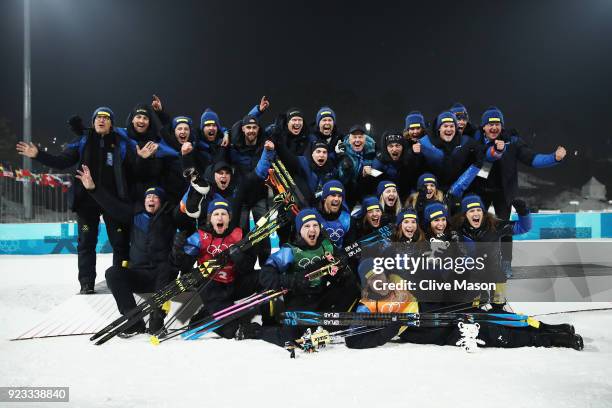 Gold medallists Peppe Femling, Jesper Nelin, Sebastian Samuelsson and Fredrik Lindstroem of Sweden celebrate with their team during the victory...