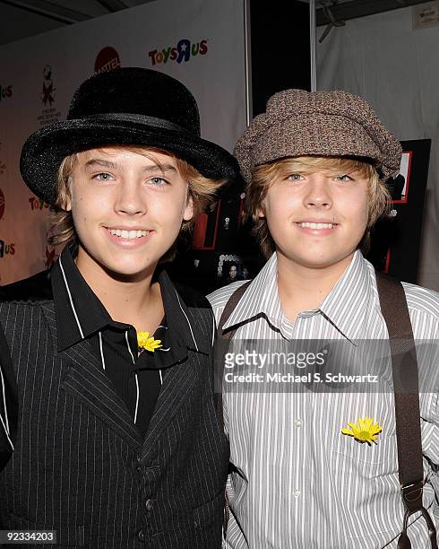 Actor Cole Sprouse and actor Dylan Sprouse attend the CAAF Dream Halloween Fundraiser at the Barker Hanger on October 24, 2009 in Santa Monica,...