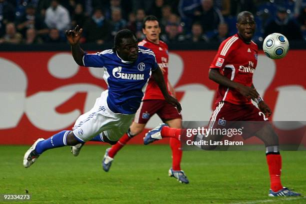 Gerald Asamoah of Schalke heads the ball during the Bundesliga match between FC Schalke 04 and Hamburger SV at Veltins Arena on October 25, 2009 in...