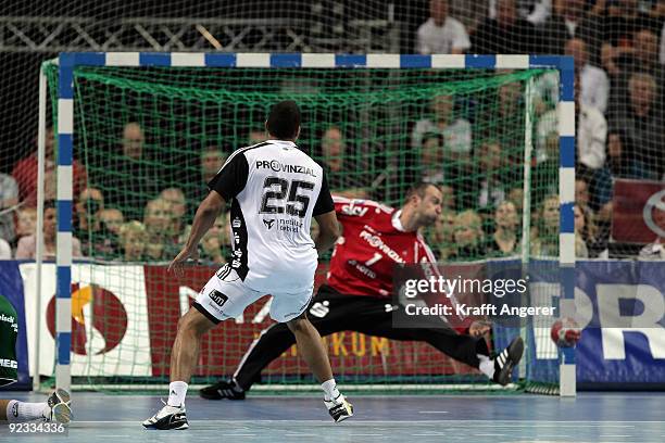 Daniel Narcisse and Thierry Omeyer of Kiel in action during the Toyota Handball Bundesliga match between THW Kiel and Frisch Auf Goeppingen at the...