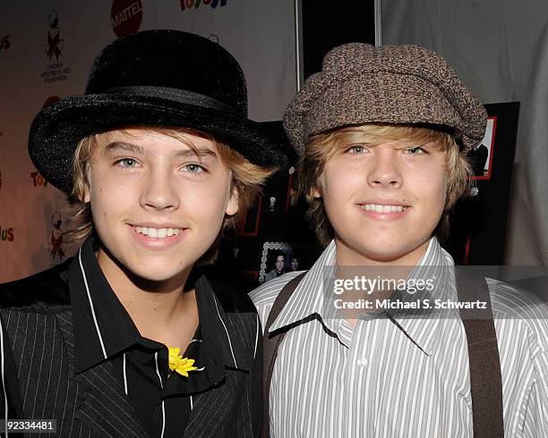 Actor Cole Sprouse and actor Dylan Sprouse attend the CAAF Dream Halloween Fundraiser at the Barker Hanger on October 24, 2009 in Santa Monica,...