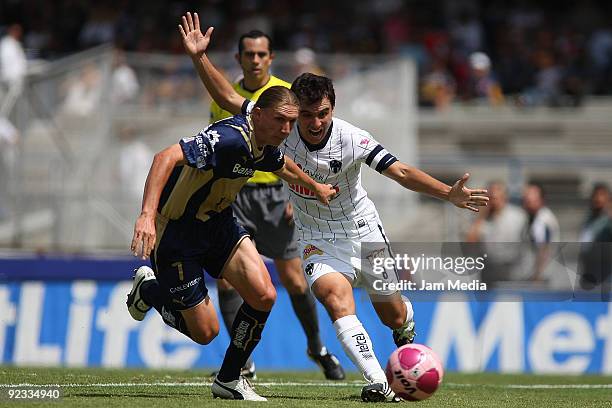 Leandro Augusto of Pumas and Luis Ernesto Perez of Monterrey during their match in the 2009 Opening tournament, the closing stage of the Mexican...