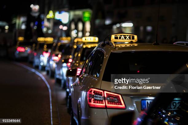 Taxis are pictured on February 16, 2018 in Munich, Deutschland.