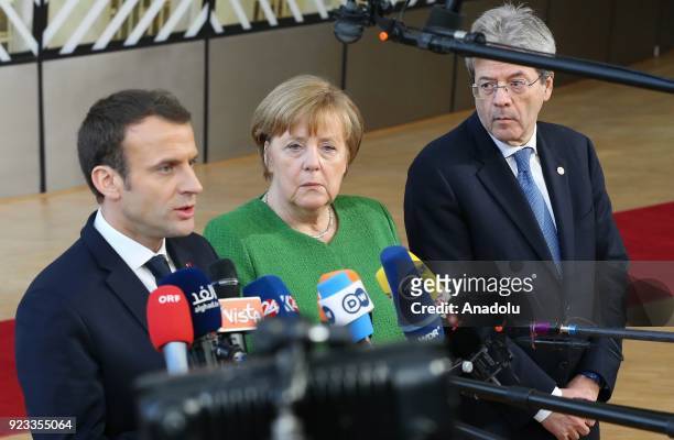 German Prime Minister Angela Merkel , French President Emmanuel Macron and Italian Prime Minister Paolo Gentiloni answer the questions of press...