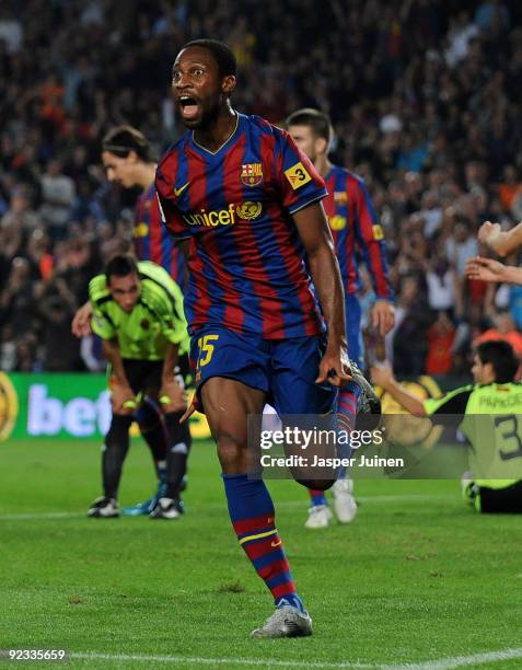 Seydou Keita of FC Barcelona celebrates scoring his side's opening goal during the La Liga match between FC Barcelona and Real Zaragoza at the Camp...